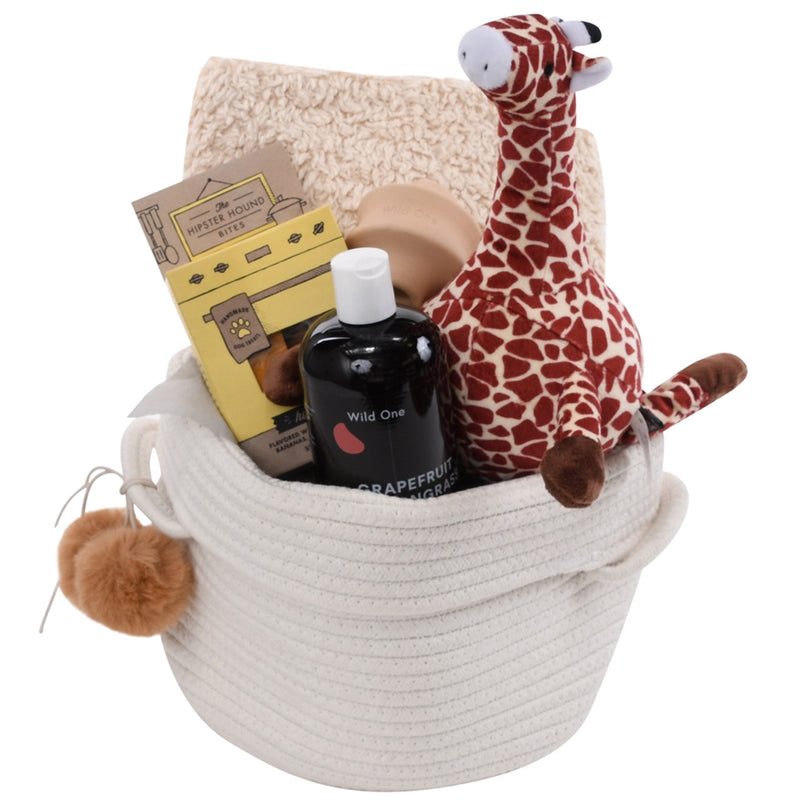 basket with a stuffed animal and other items