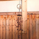 wind chime on a wood wall